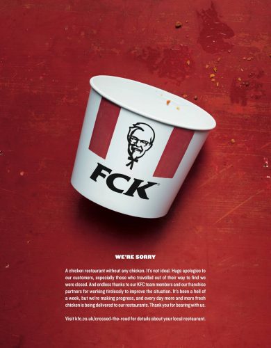 KFC apology ad showing an empty chicken bucket with the letters rearranged to read 'FCK' and a printed apology message below.