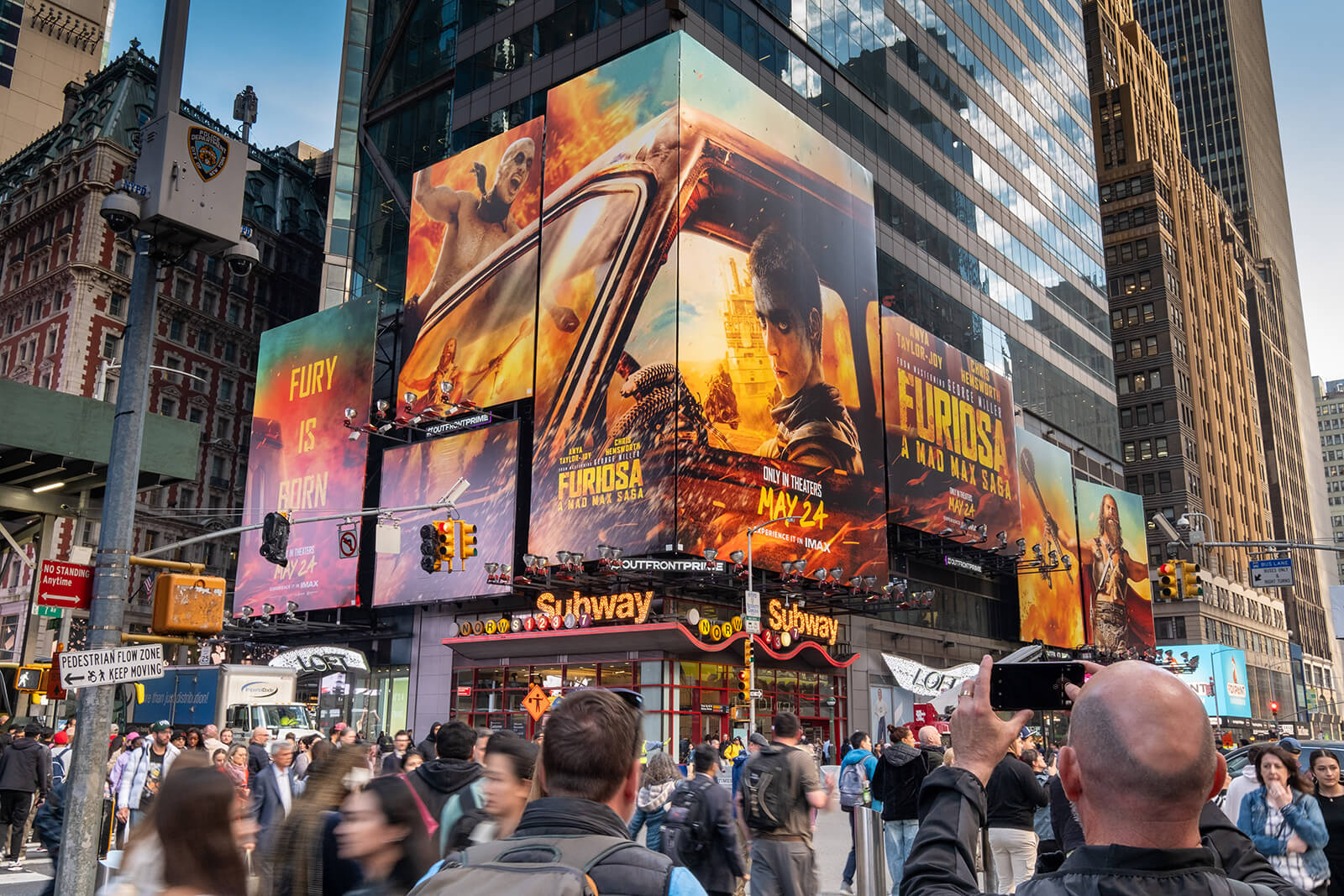 Digital billboard advertising in a busy urban area at Times Square, showing DOOH placements in high-traffic zones.