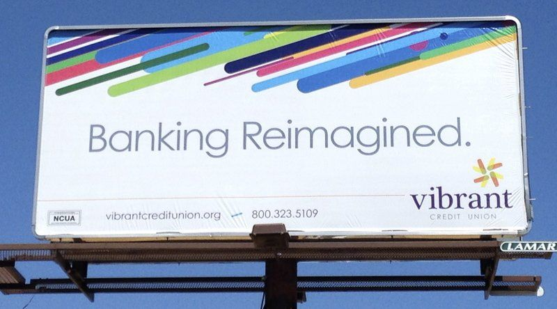 Billboard advertisement for Vibrant Credit Union with the slogan ‘Banking Reimagined.’