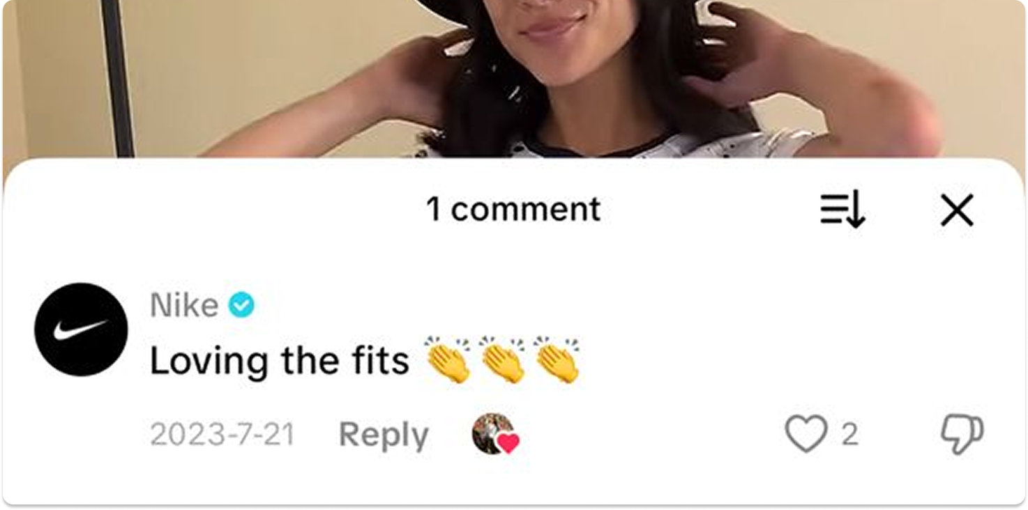 Nike replying to a social media post with a comment praising the outfit.